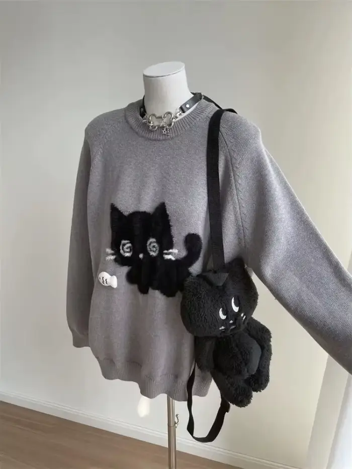 Pull en tricot gris à col rond pour femme