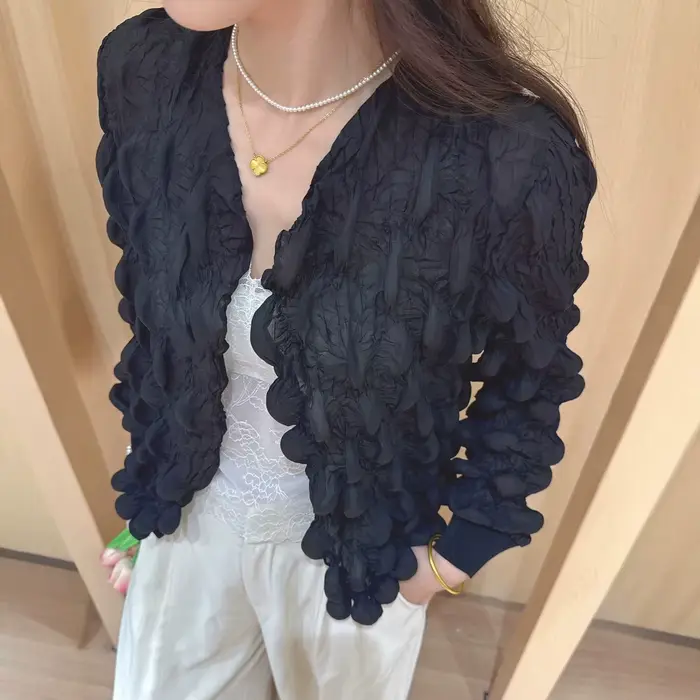 Un cardigan élégant, ample