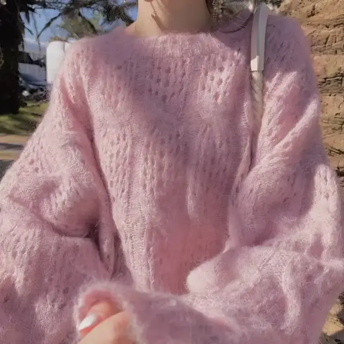 Pull évidé en mohair rose pour femme
