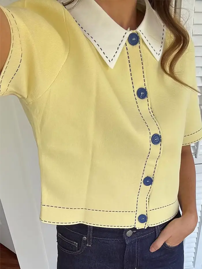 Pull tricoté à revers jaune